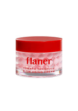 Jar of flaner tomato tanghulu slow aging cream with red lid on a white background