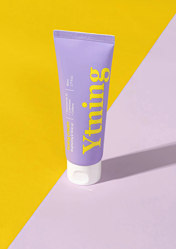 Purple tube of 'Ytning' cream on a yellow and purple background