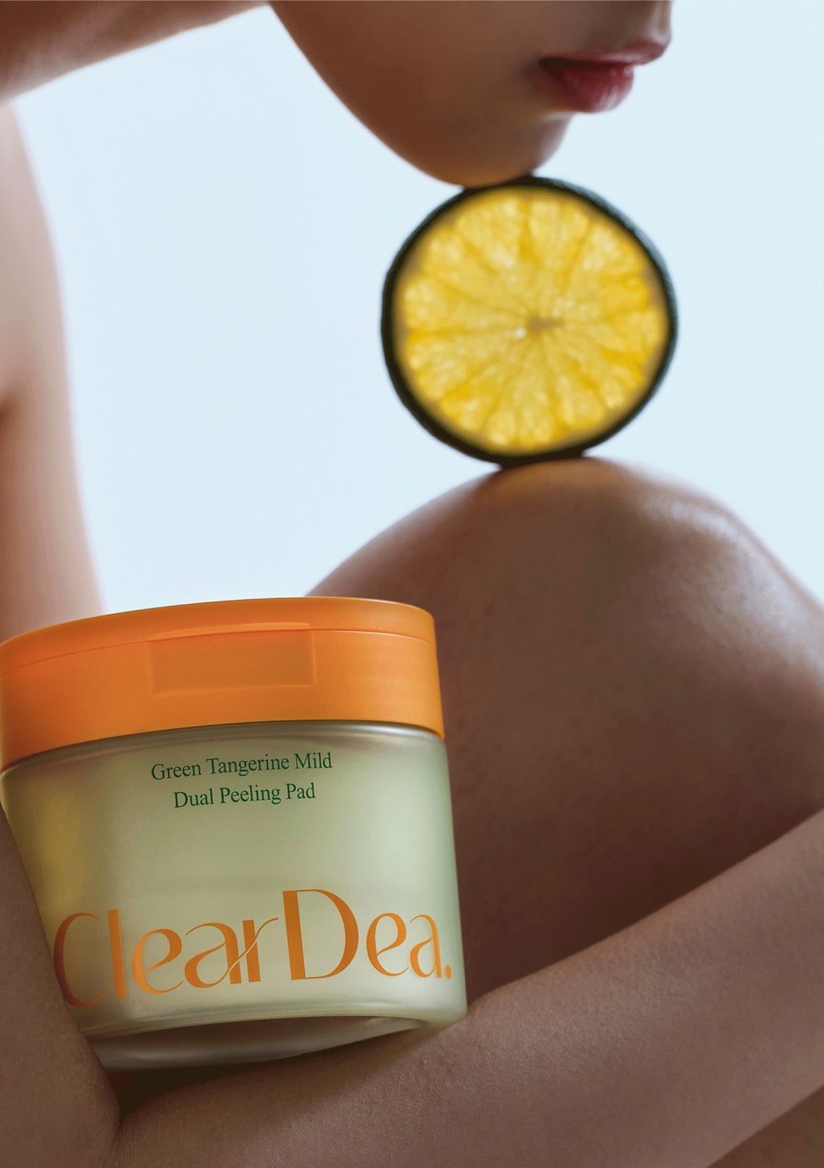 ClearDea skincare product with a lemon slice on skin