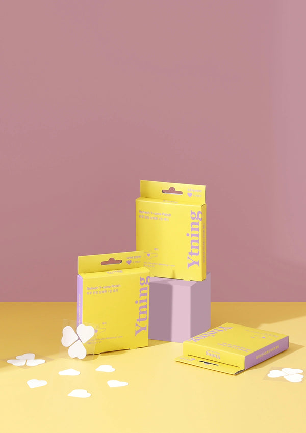 Yellow and pink boxes with 'Xiting' branding on a pink background