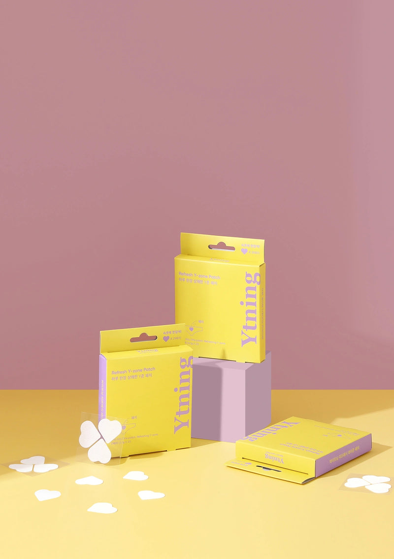 Yellow and pink boxes with 'Xiting' branding on a pink background