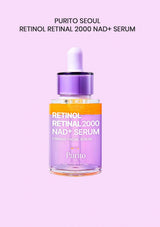 Purito Seoul Retinol Retinal 2000 NAD+ Serum in a clear glass dropper bottle with a purple cap and white dropper, set against a solid light pink background with black text at the top.