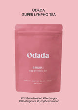 Pink package of Odada Super Lympho Tea on a pink background
