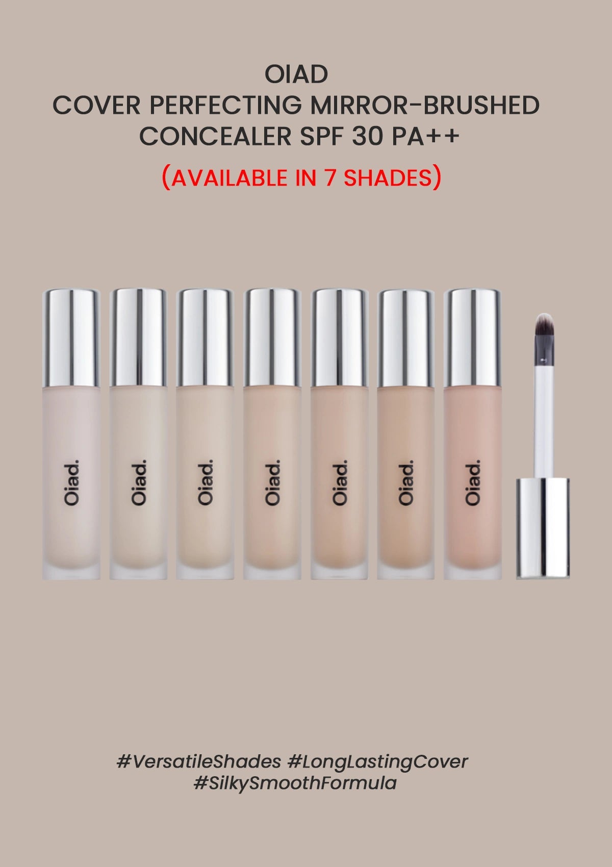 Set of OIAD concealer bottles with a brush on a beige background