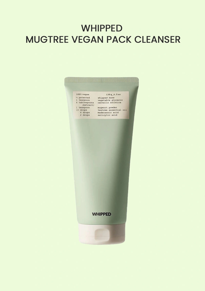 Green tube of 'WHIPPED' Mugtree Vegan Pack Cleanser on a light green background