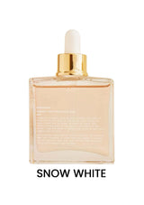 Skincare bottle labeled 'Snow White' with a gold cap on a white background