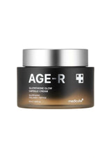 Jar of AGE-R Glutathione Glow Capsule Cream with a silver lid on a white background