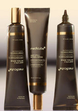 Three skincare products from Medicube on a gradient background