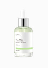 Lunik Tea Tree Relief Serum bottle on a white background