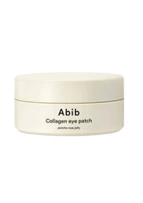 A cream-colored cosmetic jar of Abib Collagen eye patch on a solid white background.